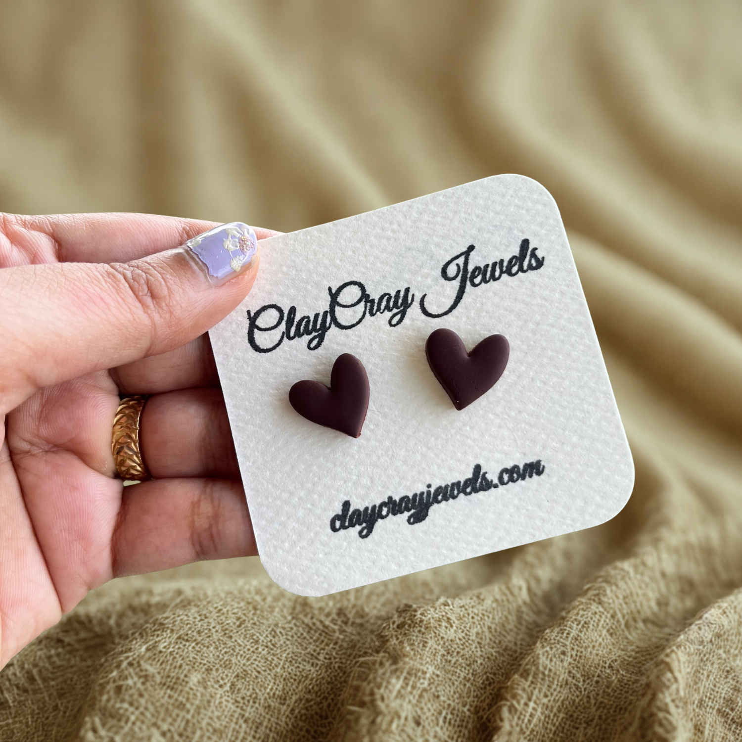 Luxury gold jewelry on marble surface